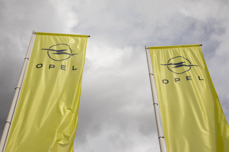 Bordeaux , France - 09 08 2024: Opel car sign text and brand logo on flag yellow pole dealership store german vehicleのeditorial素材