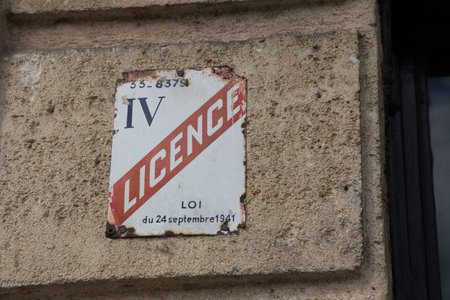 Bordeaux , France - 09 11 2024: License IV ancient old text french sign logo brand license for four enamel plates mandatory for bar restaurants in Franceのeditorial素材