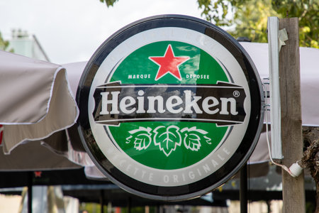 Bordeaux , France - 09 11 2024: Heineken green logo sign and brand text of pale lager beer on bar restaurant facade city wallのeditorial素材
