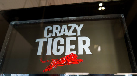 Bordeaux , France - 09 25 2024: Crazy tiger energy drink bottles can display logo brand and text sign in shop marketのeditorial素材