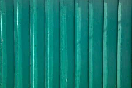 green wooden wall fence texture for background wood planks facadeの写真素材