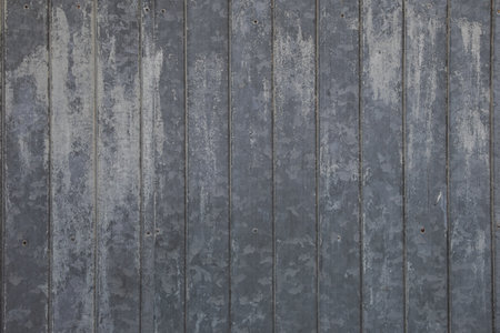 line vertical old gray wood background of wooden planks gray fence facadeの写真素材