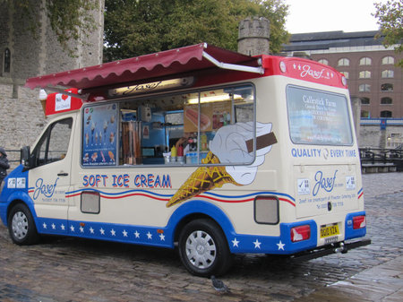 London, UK - 01 21 2025: Food truck street food ice cream truck van standing soft ice cream sell park in city street drinks for saleの写真素材