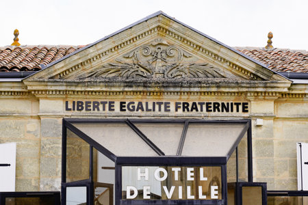hotel de ville text liberte egalite fraternite sign in building facade means in french city hall mayor and liberty equality fraternity signage on building facade entrance in town in Franceの写真素材