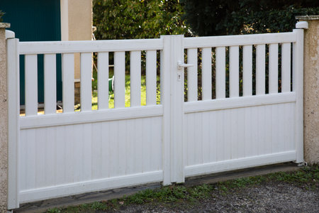 PVC double gates of modern house white home door plastic slats of modern entranceの写真素材