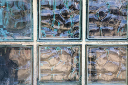 background mosaic vintage close-up view wavy texture glass brick window wallの写真素材