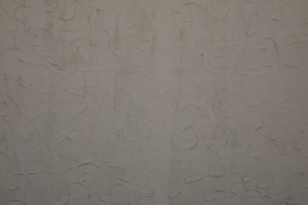 facade concrete gray wall texture beige wallpaper cement plaster gray backgroundの写真素材