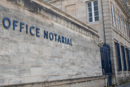 office notarial french office notaire entrance sign text and signage france notary agency in building facadeの写真素材