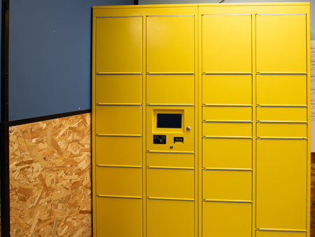 lockers yellow postal terminal delivery automat service parcel courier box form mail deliver post service conceptの写真素材