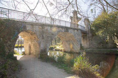 Parc Blanquefort in French southwest city with stones bridge in town parkの写真素材