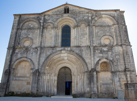 old church abbey of Saint Amant de Boixe in French village Saint-Amant-de-Boixe Franceの写真素材