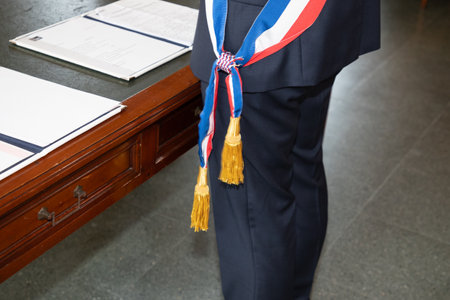 french man mayor with white red blue scarf france flag tricolor during official celebration in city hall townの写真素材