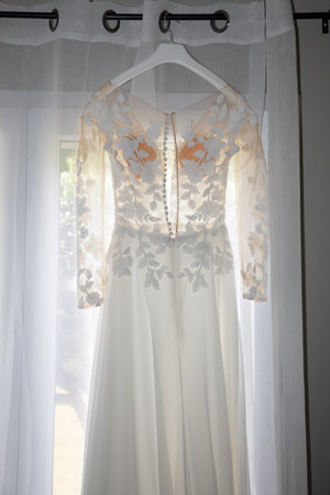 marriage day view behind rear wedding bride white dress back in dressing roomの写真素材