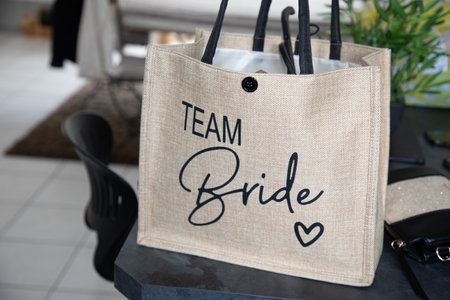team bride text sign heart in brown beige bridesmaid tote bagの写真素材