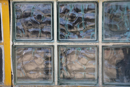 background glass brick window wall square mosaic vintage close-up view wavy textureの写真素材