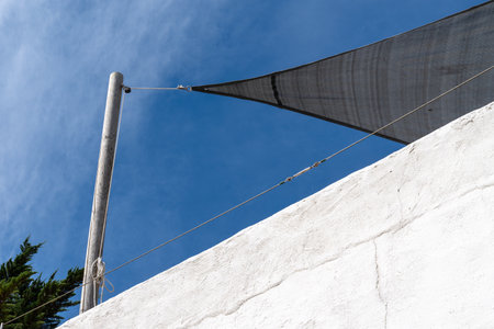 stretched canvas gray awnings structure of fabric gray tensile roof in home terrace houseの写真素材