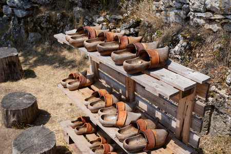 rack of rustic wooden clogs traditional displayed on wooden display in village hours la parade...