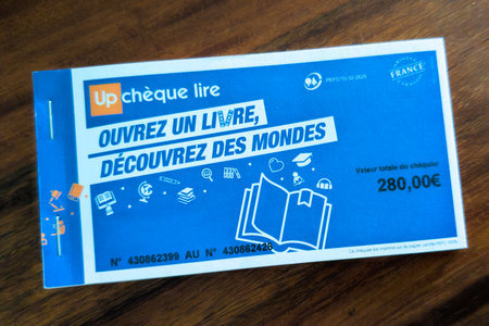 Bordeaux, France - 11 28 2025: cheque lire check read gift check brand text and sign logo for help buying books voucher booklet for shop accept read and book checks in bookstore libraryのeditorial素材
