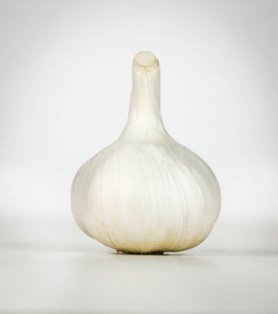 garlic isolated on white backgroundの写真素材