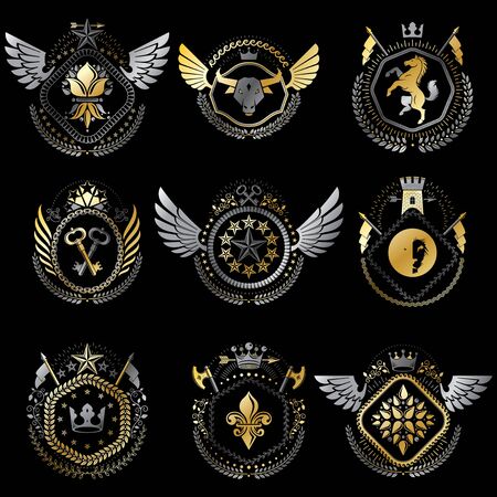 Set of vector vintage emblems created with decorative elements like crowns, stars, bird wings, armory and animals.  Collection of heraldic coat of arms.のイラスト素材