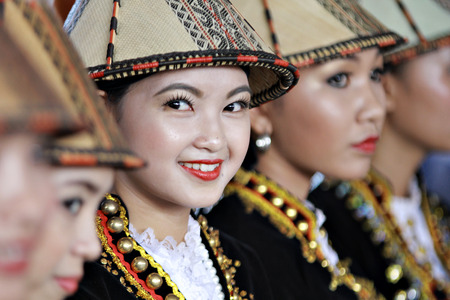 Kota Kinabalu, Sabah Malaysia.May 30, 2015 : Kadazan papar ladies in elaborated colorful traditional costume during Pesta Kaamatan or Harvest Festival in Sabah Borneo. Image contains shadow from natural lights.のeditorial素材