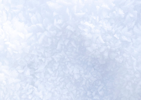 Close-up of snow, texture of virgin snow with some shadows