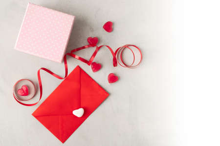 Background with flowers, cards, sweets and gifts for celebrations, birthdays, valentine's day or for any day you want to surprise someone. Wood backgroundの写真素材