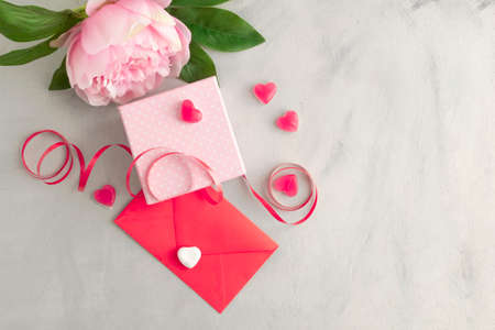 Background with flowers, cards, sweets and gifts for celebrations, birthdays, valentine's day or for any day you want to surprise someone. Wood backgroundの写真素材