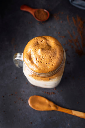 Dalgona coffee, a refreshing coffee drink perfect for summer days. Coffee, milk, sugar and ice....