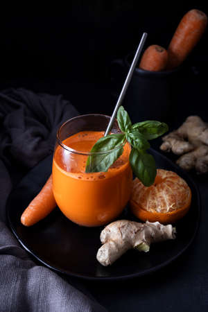 Homemade carrot, ginger and orange juice. Detox juiceの写真素材