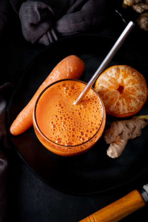 Homemade carrot, ginger and orange juice. Detox juiceの写真素材