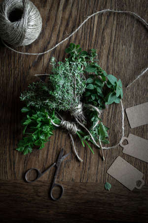 Bouquets of fresh and aromatic herbs: parsley, oregano and thyme