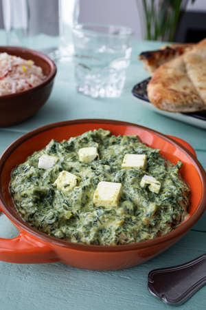 Palak paneer, a popular vegetarian dish in Indian cuisine made with spinach and paneer cheese.の写真素材