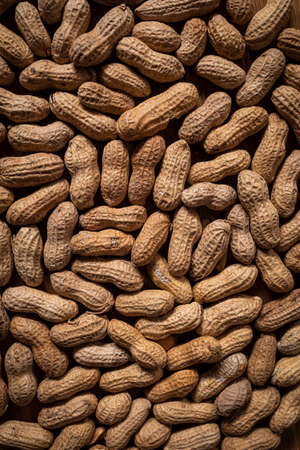 Peanuts in their shells. Texture background with peanuts