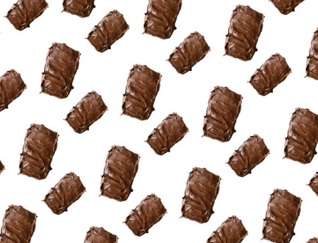 Pattern with bread with delicious chocolate cream. Chocolate cream texture with white backgroundの写真素材