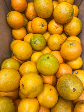 Oranges for sale in bulk at the marketの写真素材