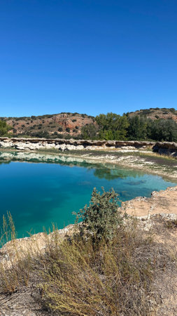 Crystal water in Lagunas de la Lengua in Ruidera in Castilla la Mancha, Spainの写真素材