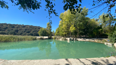 BaÃ±os de las Mulas in Ruidera in Castilla la Mancha, Spain. Among the fauna of the lagoons there are fish such as boga, carp, pike and black-bass.の写真素材