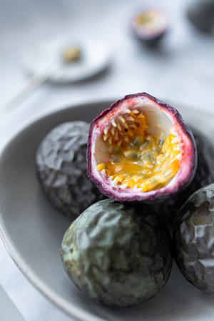 Passion Fruit Illuminated in Kitchen Daylightの写真素材