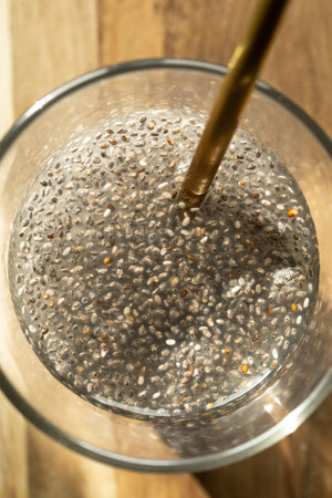 A highly detailed close-up image of soaked chia seeds, focusing on the gel-like texture (mucilage) formed after hydration.の写真素材