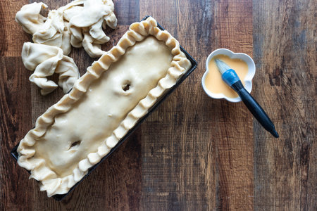 Artisanal Raw Pork Pie: Handmade, awaiting its golden transformation.