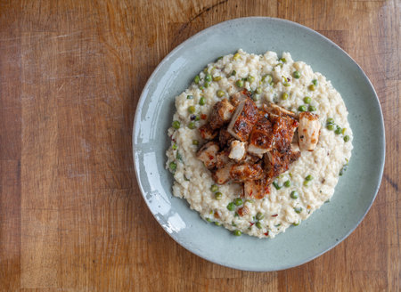 Luscious Green Peas Risotto: Sweet Chilli Chicken Delight.の写真素材