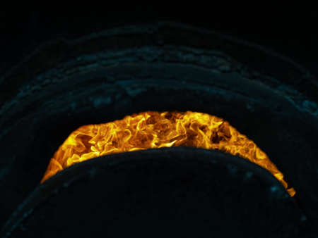 Charcoal production in electric furnaces. Burning coals. Metallurgical industry, heavy industry, mechanical engineering, coal productionの写真素材