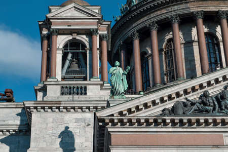 Isaac's Cathedral, Saint Petersburg, Russia, 11.10. Historic building is in style of classicism. Facade, exterior with green sculptures, statues, colonnade, bell tower. Sun lightのeditorial素材
