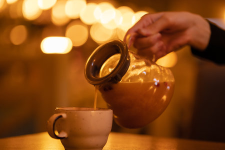 Buckthorn tea is poured into a mugの素材 [FY310170726297]