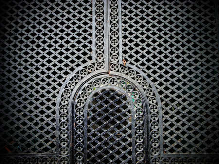 Iron door in the Muslim style. In oriental style. In one of the courtyards of the old town.の写真素材