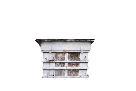 Bee hive is isolated. Old broken.の写真素材