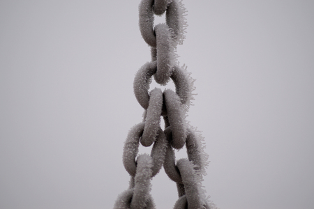 Chain covered in iceの写真素材