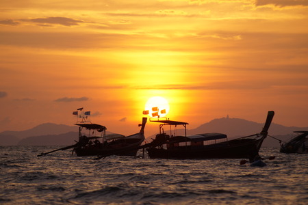 Boats in sunsetの写真素材