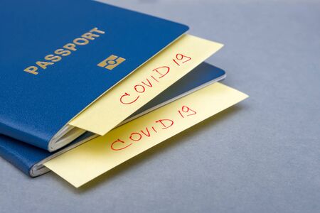 Coronavirus and travel concept. The concept of restrictions for tourism. Passport for travel. Quarantine. Restriction for tourists. Covid19 Corona virus disease danger pandemic spread worldwide globalの写真素材